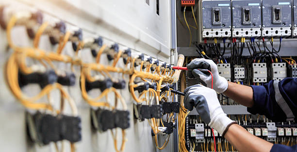 Professional Electrician technician working in Harrington, DE